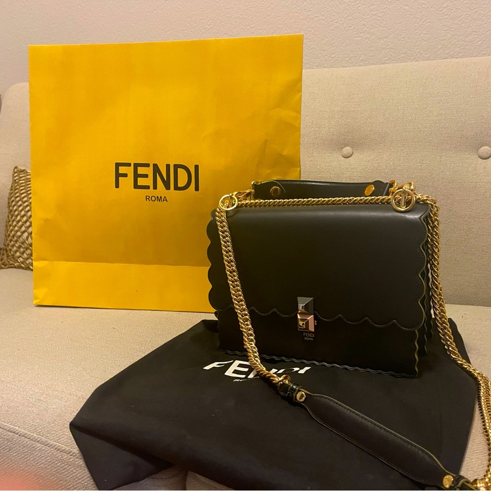 Original Fendi bag, black with gold and black leather strap, bag never used.